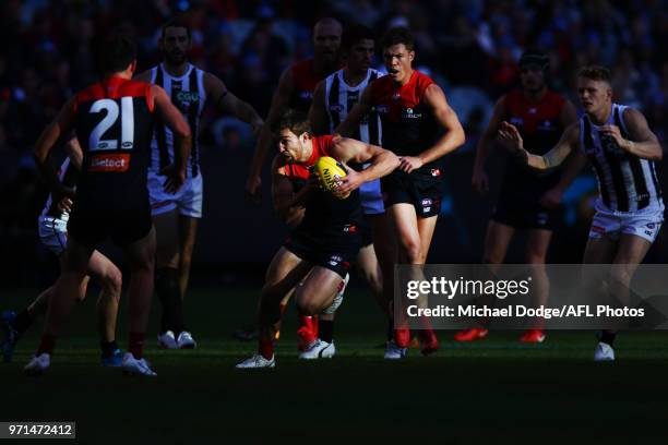 Jack Viney of the Demons runs with the ball during the round seven AFL match between the Western Bulldogs and the Gold Coast Suns at Mars Stadium on...