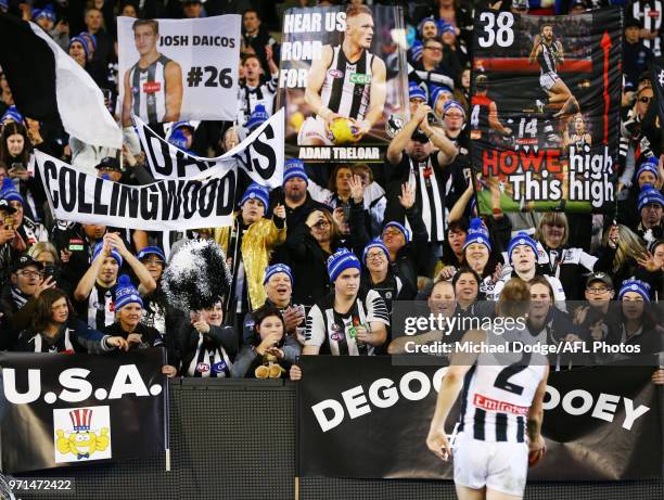 Jordan de Goey of the Magpies celebrates the win with fans during the round seven AFL match between the Western Bulldogs and the Gold Coast Suns at...