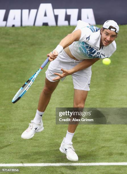 Jan-Lennard Struff of Germany serves the ball to Rudolf Molleker of Germany during day 1 of the Mercedes Cup at Tennisclub Weissenhof on June 11,...