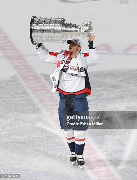 Alex Chiasson of the Washington Capitals hoists the Stanley Cup after Game Five of the 2018 NHL Stanley Cup Final at T-Mobile Arena on June 7, 2018...