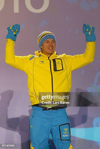 Andre Myhrer of Sweden celebrates Bronze during the medal ceremony for the Alpine Men's Slalom on day 16 of the Vancouver 2010 Winter Olympics at...