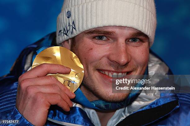 Giuliano Razzoli of Italy celebrates the gold medal during the medal ceremony for the Alpine Men's Slalom on day 16 of the Vancouver 2010 Winter...