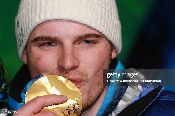 Giuliano Razzoli of Italy celebrates the gold medal during the medal ceremony for the Alpine Men's Slalom on day 16 of the Vancouver 2010 Winter...