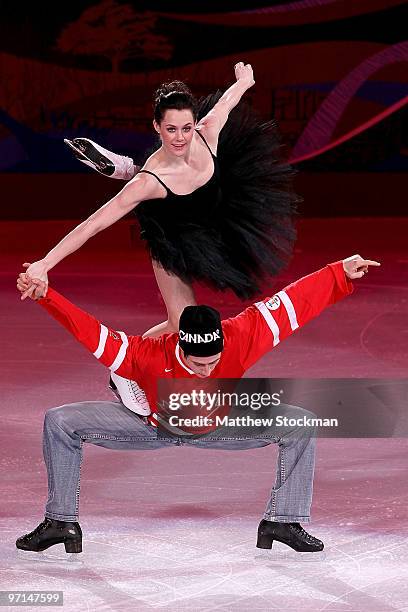 Tessa Virtue and Scott Moir of Canada perform at the Exhibition Gala following the Olympic figure skating competition at Pacific Coliseum on February...