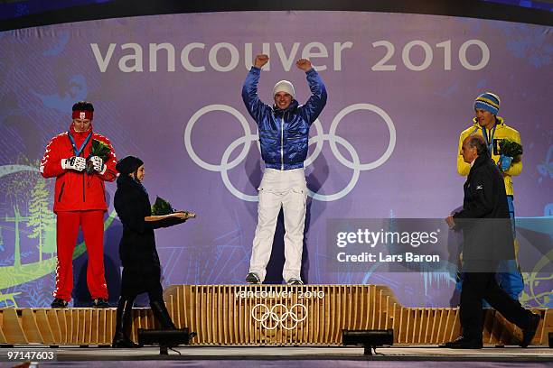 Ivica Kostelic of Croatia celebrates his Silver medal, Giuliano Razzoli of Italy Gold, and Andre Myhrer of Sweden Bronze during the medal ceremony...