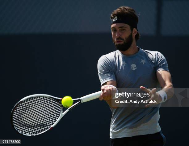 Nikoloz Basilashvili of Georgia in action against Yuichi Sugita of Japan on day Day One of the Libema Open 2018 on June 11, 2018 in Rosmalen,...