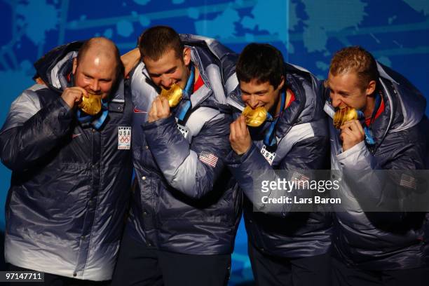 Team USA celebrate Gold during the medal ceremony for the Men's Four-Man Bobsleigh on day 16 of the Vancouver 2010 Winter Olympics at Whistler Medals...