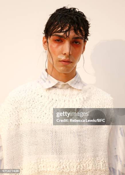 Model poses at the Ka Wa Key DiscoveryLAB during London Fashion Week Men's June 2018 at the BFC Show Space on June 11, 2018 in London, England.