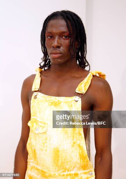 Model poses at the Ka Wa Key DiscoveryLAB during London Fashion Week Men's June 2018 at the BFC Show Space on June 11, 2018 in London, England.