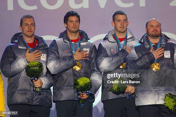 Team USA celebrate Gold during the medal ceremony for the Men's Four-Man Bobsleigh on day 16 of the Vancouver 2010 Winter Olympics at Whistler Medals...