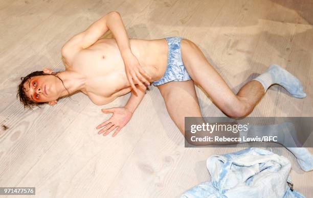 Model poses at the Ka Wa Key DiscoveryLAB during London Fashion Week Men's June 2018 at the BFC Show Space on June 11, 2018 in London, England.