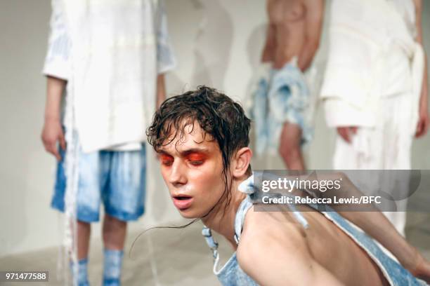 Model poses at the Ka Wa Key DiscoveryLAB during London Fashion Week Men's June 2018 at the BFC Show Space on June 11, 2018 in London, England.