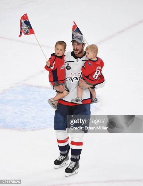 Jay Beagle of the Washington Capitals skates on the ice with his children after Game Five of the 2018 NHL Stanley Cup Final at T-Mobile Arena on June...