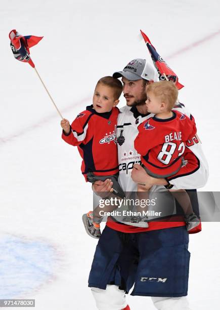 Jay Beagle of the Washington Capitals skates on the ice with his children after Game Five of the 2018 NHL Stanley Cup Final at T-Mobile Arena on June...