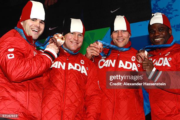 Team Canada celebrate Bronze during the medal ceremony for the Men's Four-Man Bobsleigh on day 16 of the Vancouver 2010 Winter Olympics at Whistler...