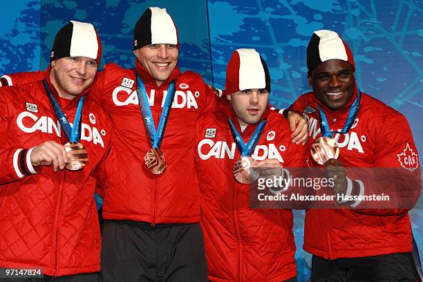 Team Canada celebrate Bronze during the medal ceremony for the Men's Four-Man Bobsleigh on day 16 of the Vancouver 2010 Winter Olympics at Whistler...