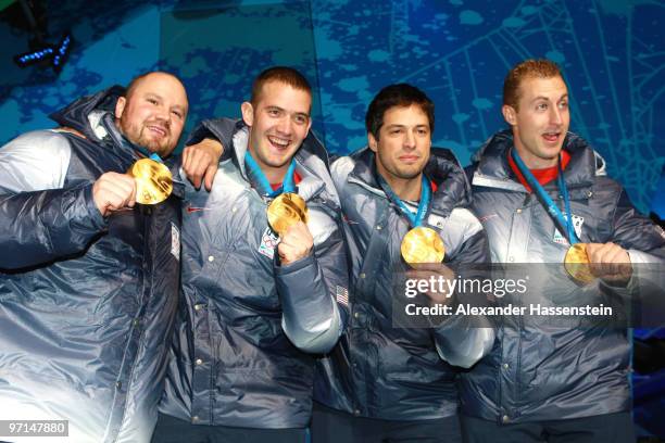 Team USA celebrate Gold during the medal ceremony for the Men's Four-Man Bobsleigh on day 16 of the Vancouver 2010 Winter Olympics at Whistler Medals...