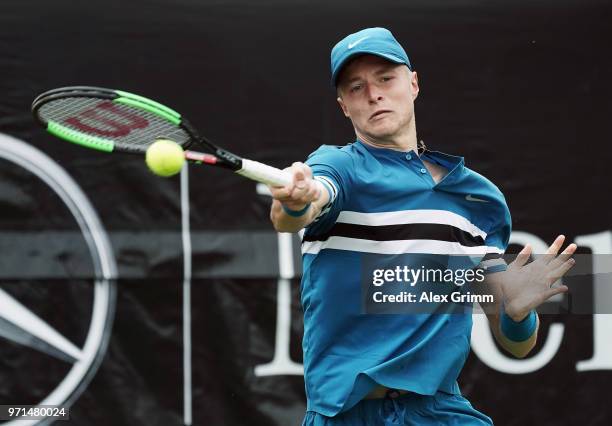 Rudolf Molleker of Germany plays a forehand to Jan-Lennard Struff of Germany during day 1 of the Mercedes Cup at Tennisclub Weissenhof on June 11,...