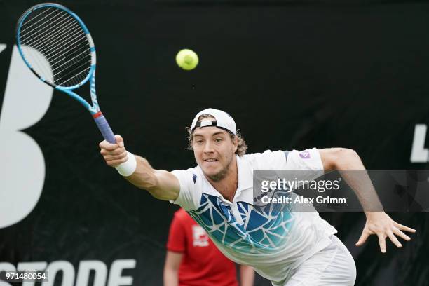 Jan-Lennard Struff of Germany plays a forehand to Rudolf Molleker of Germany during day 1 of the Mercedes Cup at Tennisclub Weissenhof on June 11,...
