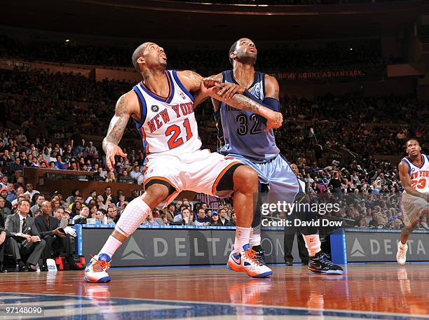 Wilson Chandler of the New York Knicks boxes out O.J. Mayo of the Memphis Grizzlies on February 27, 2010 at Madison Square Garden in New York City....