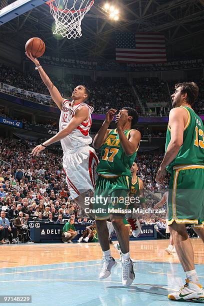 Kevin Martin of the Houston Rockets goes up for the shot over Ronnie Price of the Utah Jazz at EnergySolutions Arena on February 27, 2010 in Salt...