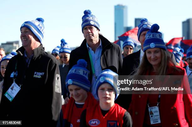 Gillon McLachlan, Chief Executive Officer of the AFL walks with Neale Daniher for the "Zurich Walk to the G" before the Big Freeze 4 fundraiser for...