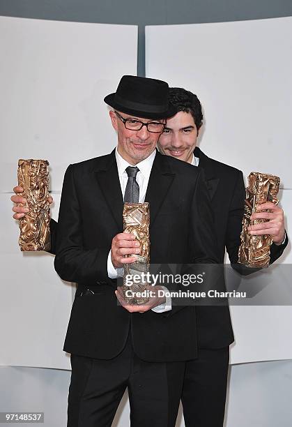 Designer Jacques Audiard and Actor Tahar Rahim pose in Awards Room during 35th Cesar Film Awards at Theatre du Chatelet on February 27, 2010 in...