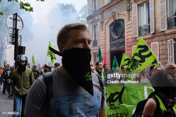 The railway workers of the SUD RAIL union demonstrate from the National Assembly to the Senate for the withdrawal of the rail pact, on 11 June 2018...