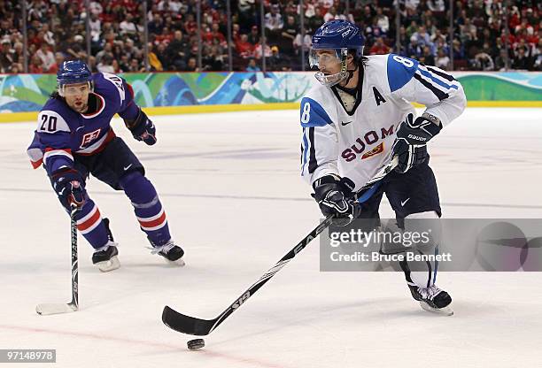 Teemu Selanne of Finland handles the puck during the ice hockey men's bronze medal game between Finland and Slovakia on day 16 of the Vancouver 2010...