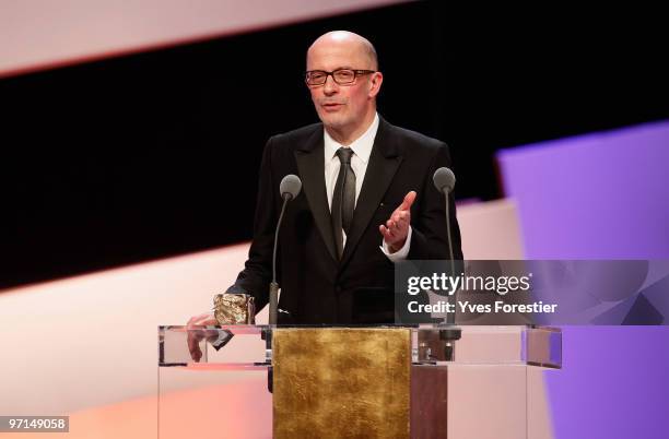Director Jacques Audiard speaks onstage after he received Best Original Screebplay Cesar Award during the 35th Cesar Film Awards at the Theatre du...