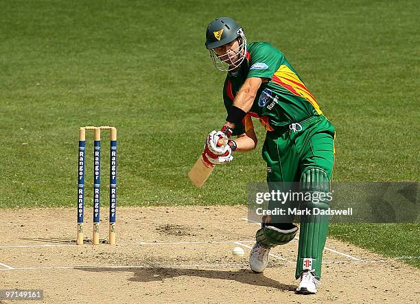 Michael Dighton of the Tigers smashes Damien Wright of the Bushrangers straight down the ground during the Ford Ranger Cup Final match between the...