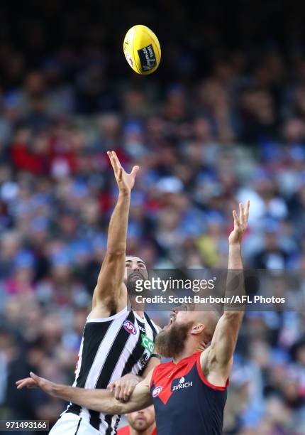 Max Gawn of the Demons and Brodie Grundy of the Magpies compete for the ball during the round 12 AFL match between the Melbourne Demons and the...
