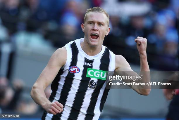 Jaidyn Stephenson of the Magpies celebrates after kicking a goal during the round 12 AFL match between the Melbourne Demons and the Collingwood...