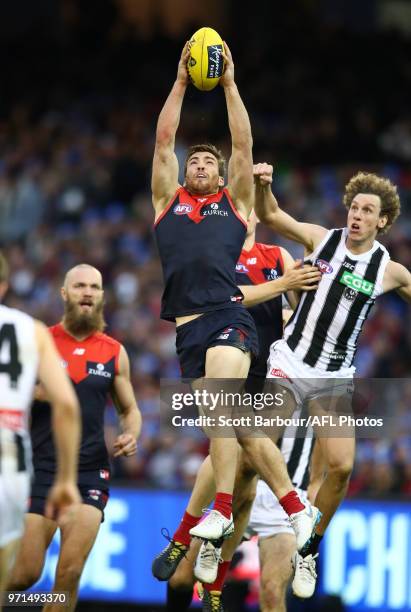 Jack Viney of the Demons marks the ball during the round 12 AFL match between the Melbourne Demons and the Collingwood Magpies at Melbourne Cricket...