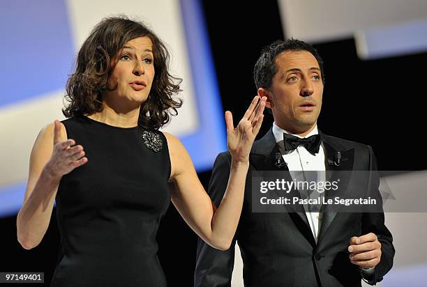 Hosts Valerie Lemercier and Gad Elmaleh speak on stage during the 35th Cesar Film Awards at the Theatre du Chatelet on February 27, 2010 in Paris,...