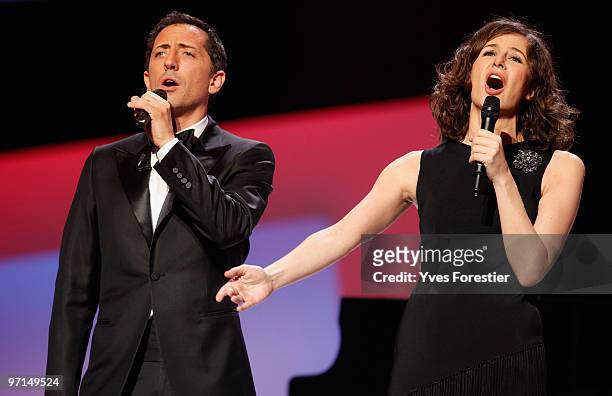 Hosts Gad Elmaleh and Valerie Lemercier speak onstage during the 35th Cesar Film Awards held at Theatre du Chatelet on February 27, 2010 in Paris,...