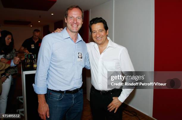 Christian Prudhomme and Laurent Gerra attend "Sans Moderation" Laurent Gerra's One Man Show at Palais des Congres on June 8, 2018 in Paris, France.