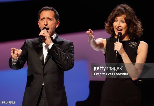 Hosts Gad Elmaleh and Valerie Lemercier speak onstage during the 35th Cesar Film Awards held at Theatre du Chatelet on February 27, 2010 in Paris,...