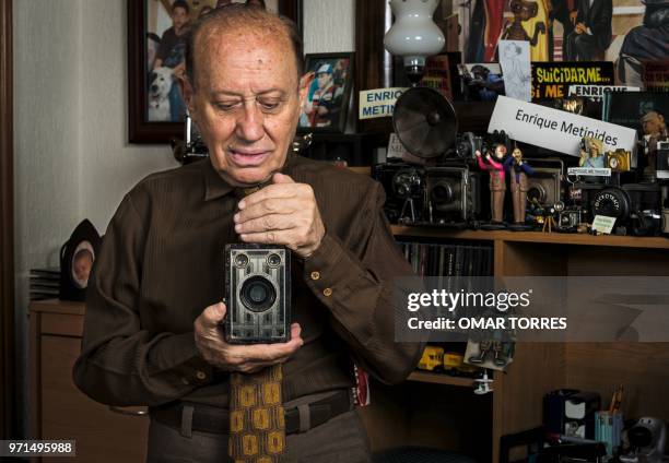 Mythical Mexican photographer Enrique Metinides, who covered the "red notes" , poses for pictures with his first camera, a Brownie Junior Six-16,...