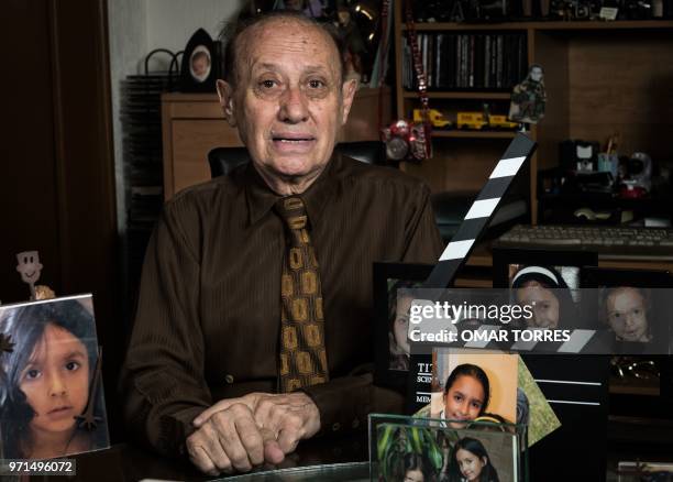 Mythical Mexican photographer Enrique Metinides, who covered the "red notes" , poses for pictures during a photo session in Mexico City on June 6,...