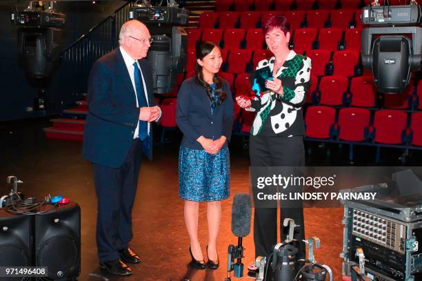 Japan's Princess Kako , the daughter of Japan's Prince Akishino and Princess Kiko, speaks with University of Leeds Vice-Chancellor Alan Langlands ,...