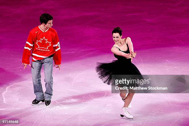 Tessa Virtue and Scott Moir of Canada perform at the Exhibition Gala following the Olympic figure skating competition at Pacific Coliseum on February...
