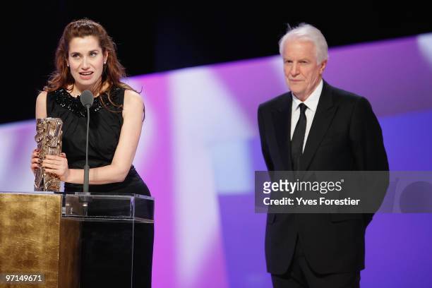 Emmanuelle Devos and Andre Dussolier speak onstage during the 35th Cesar Film Awards held at Theatre du Chatelet on February 27, 2010 in Paris,...