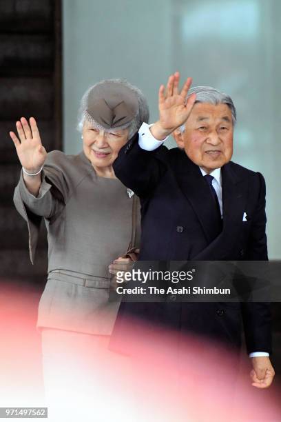Emperor Akihito and Empress Michiko wave to well-wishers on arrival at Soma City Hall on June 11, 2018 in Soma, Fukushima, Japan. This 3-day trip...