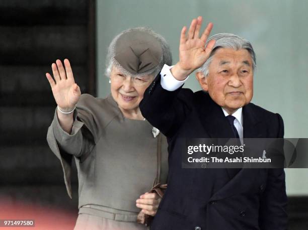 Emperor Akihito and Empress Michiko wave to well-wishers on arrival at Soma City Hall on June 11, 2018 in Soma, Fukushima, Japan. This 3-day trip...