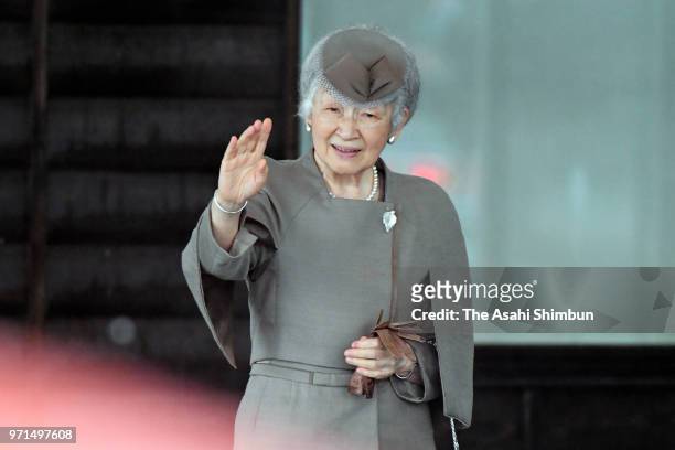 Empress Michiko waves to well-wishers on arrival at Soma City Hall on June 11, 2018 in Soma, Fukushima, Japan. This 3-day trip could be the couple's...