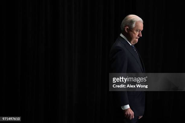 Attorney General Jeff Sessions listens as he is introduced during the Justice Department's Executive Officer for Immigration Review Annual Legal...