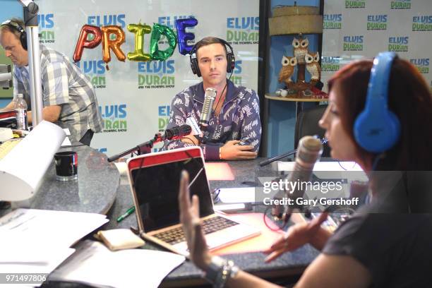 Figure skater Adam Rippon is interviewed by radio personality Danielle Monaro during ' The Elvis Duran Z100 Morning Show' at Z100 Studio on June 11,...