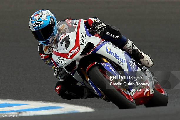 Carlos Checa of Spain and the Althea Racing Team rounds the bend during the Superbike World Championship round one race two at Phillip Island Grand...