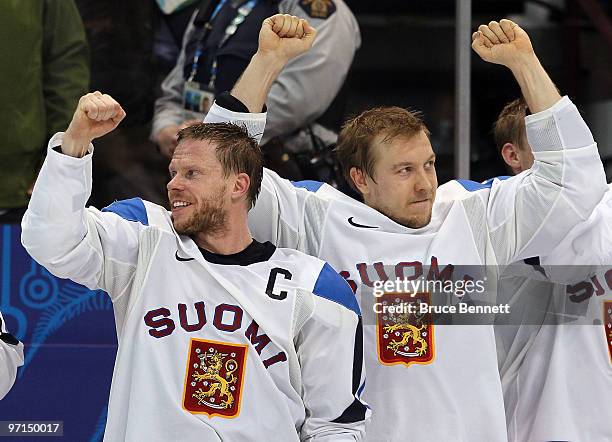 Niklas Hagman and Saku Koivu of Finland celebrate after winning the bronze medal after the ice hockey men's bronze medal game between Finland and...